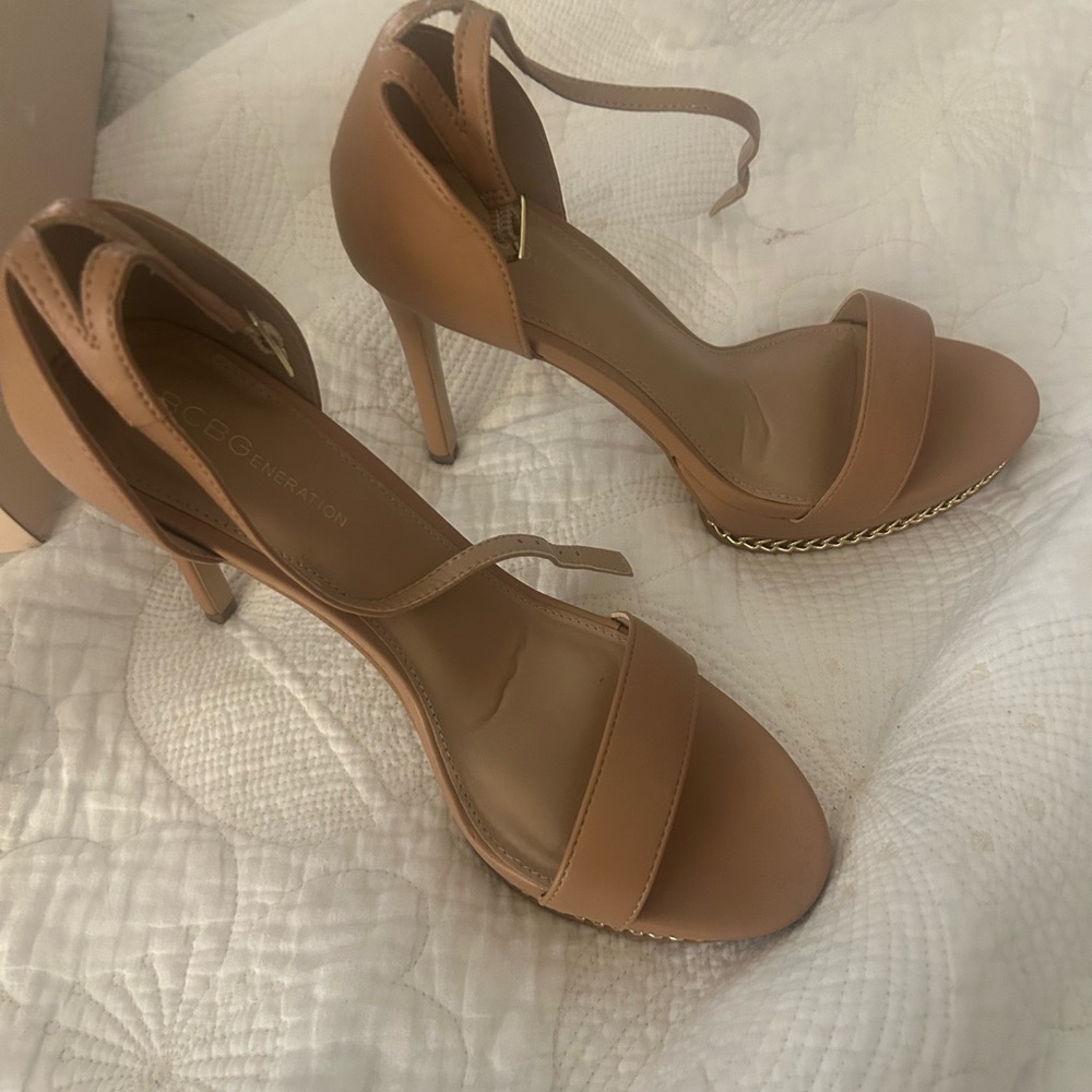 Bcgeneration platform sandal with chain detail and ankle strap.